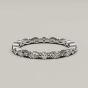 Giovane - Feminine Moissanite Eternity Ring in 18ct Gold - Vucceli