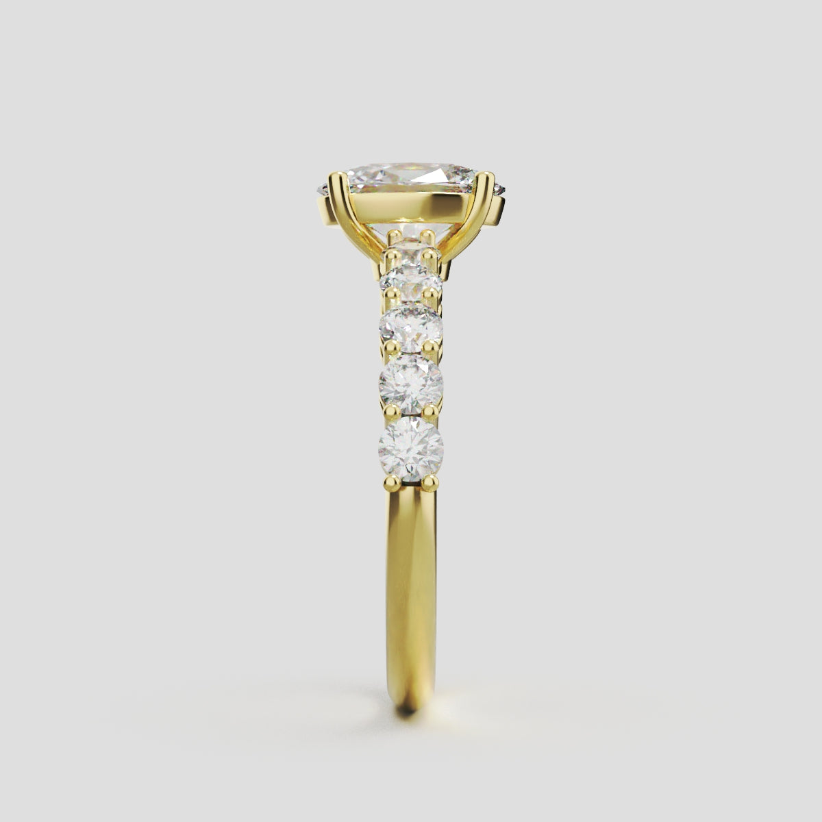 Rivo, 1ct oval lab grown diamond engagement ring, 2.5mm Side Stones, 18K yellow gold - side view