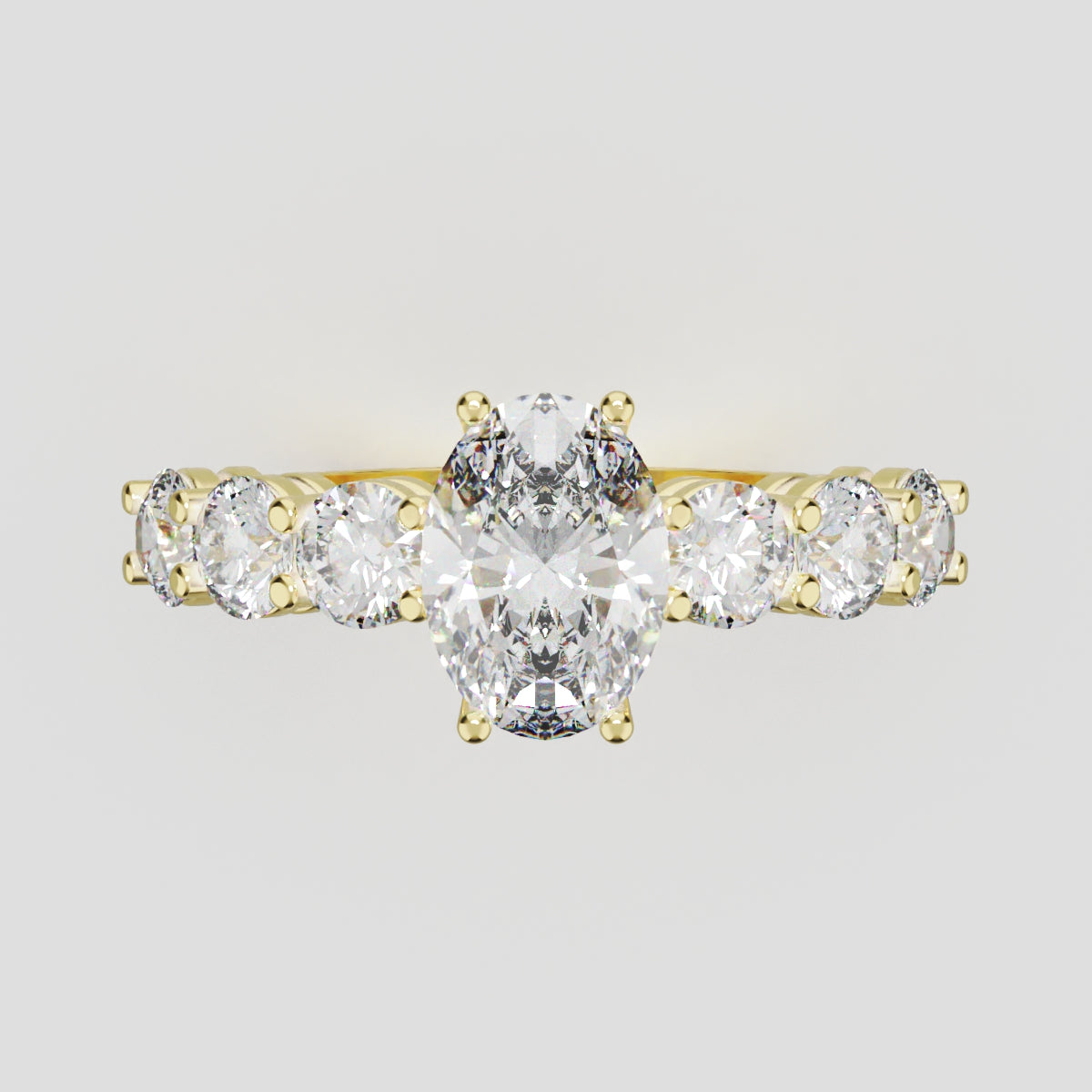 Delta, 1ct oval lab grown diamond engagement ring, 3.5mm Side Stones, 18K yellow gold - front view