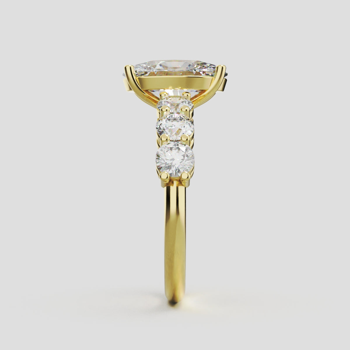 Delta, 2ct oval lab grown diamond engagement ring, 3.5mm Side Stones, 18K yellow gold - side view