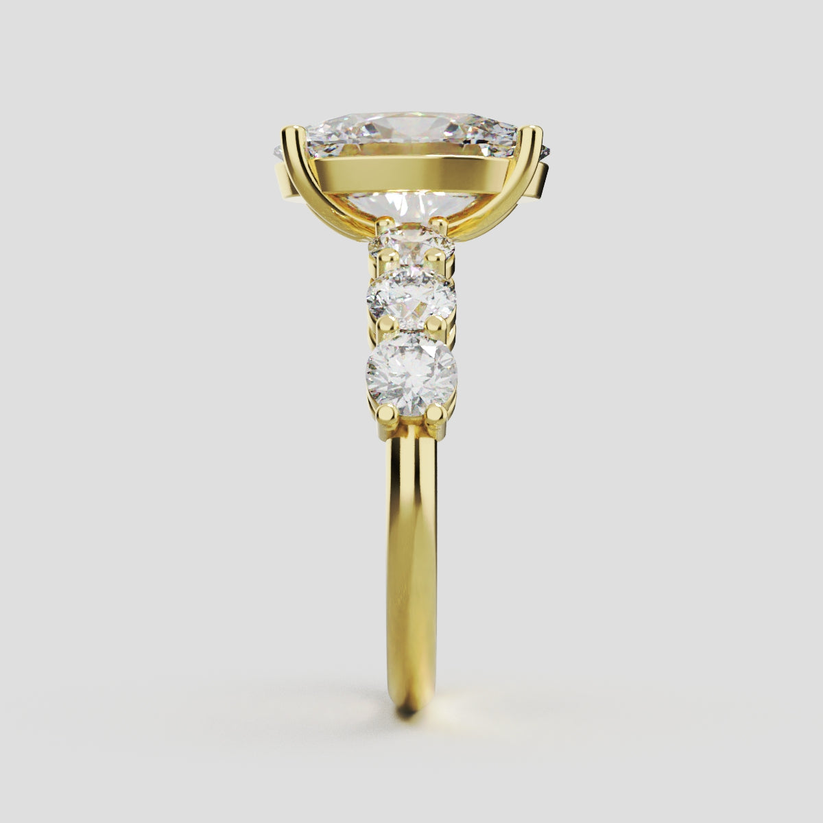 Delta, 3ct oval lab grown diamond engagement ring, 3.5mm Side Stones, 18K yellow gold - side view