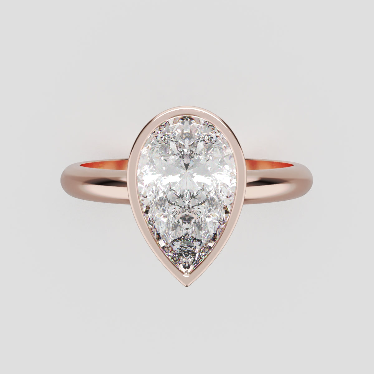 Scudo, 1.5ct pear lab grown diamond engagement ring, Bezel, 18K rose gold - front view