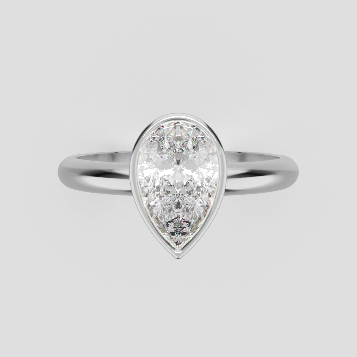 Scudo, 1ct pear lab grown diamond engagement ring, Bezel, 18K white gold - front view