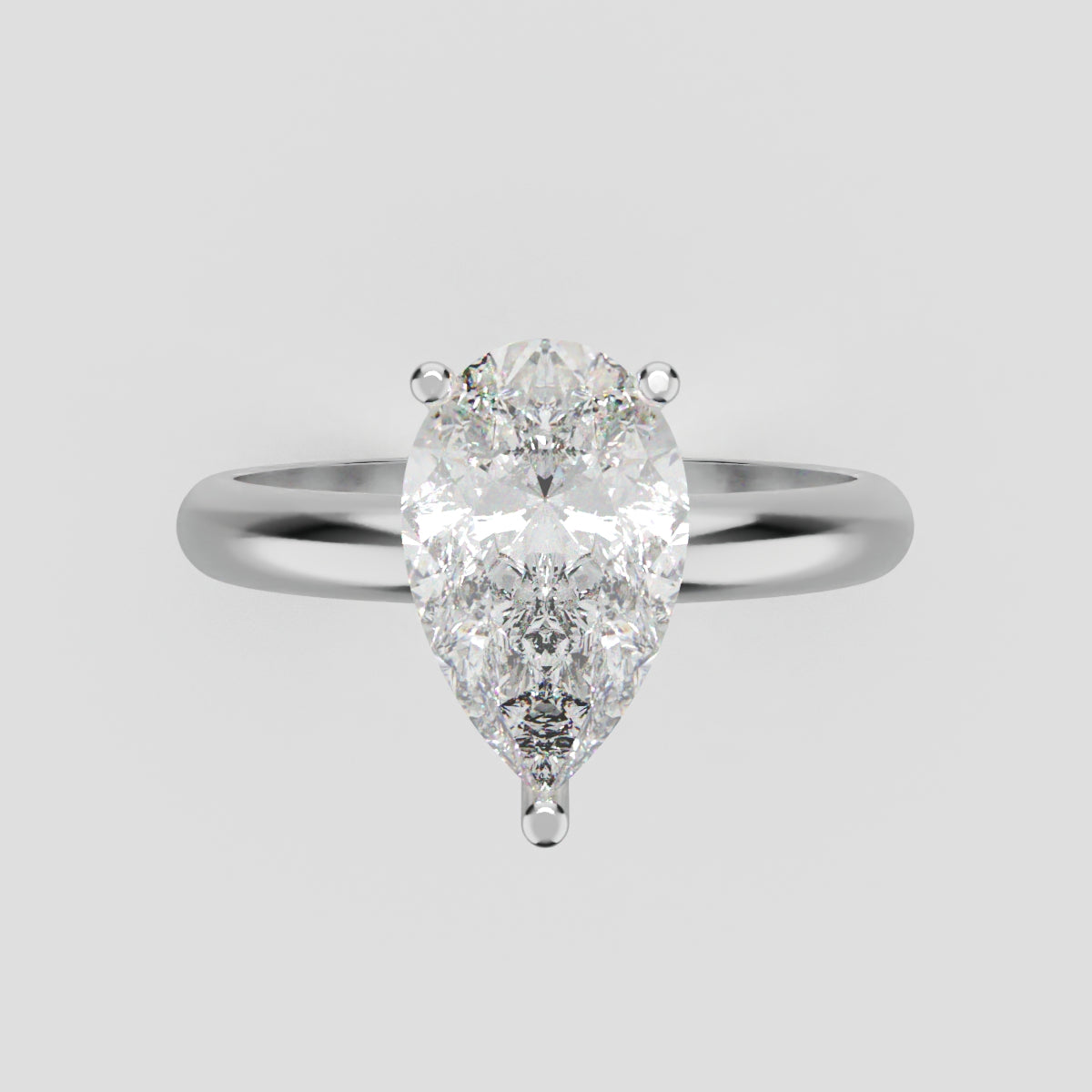 Riparo, 1.5ct pear lab grown diamond engagement ring, Plain Sides, Hidden Halo, 18K white gold - front view