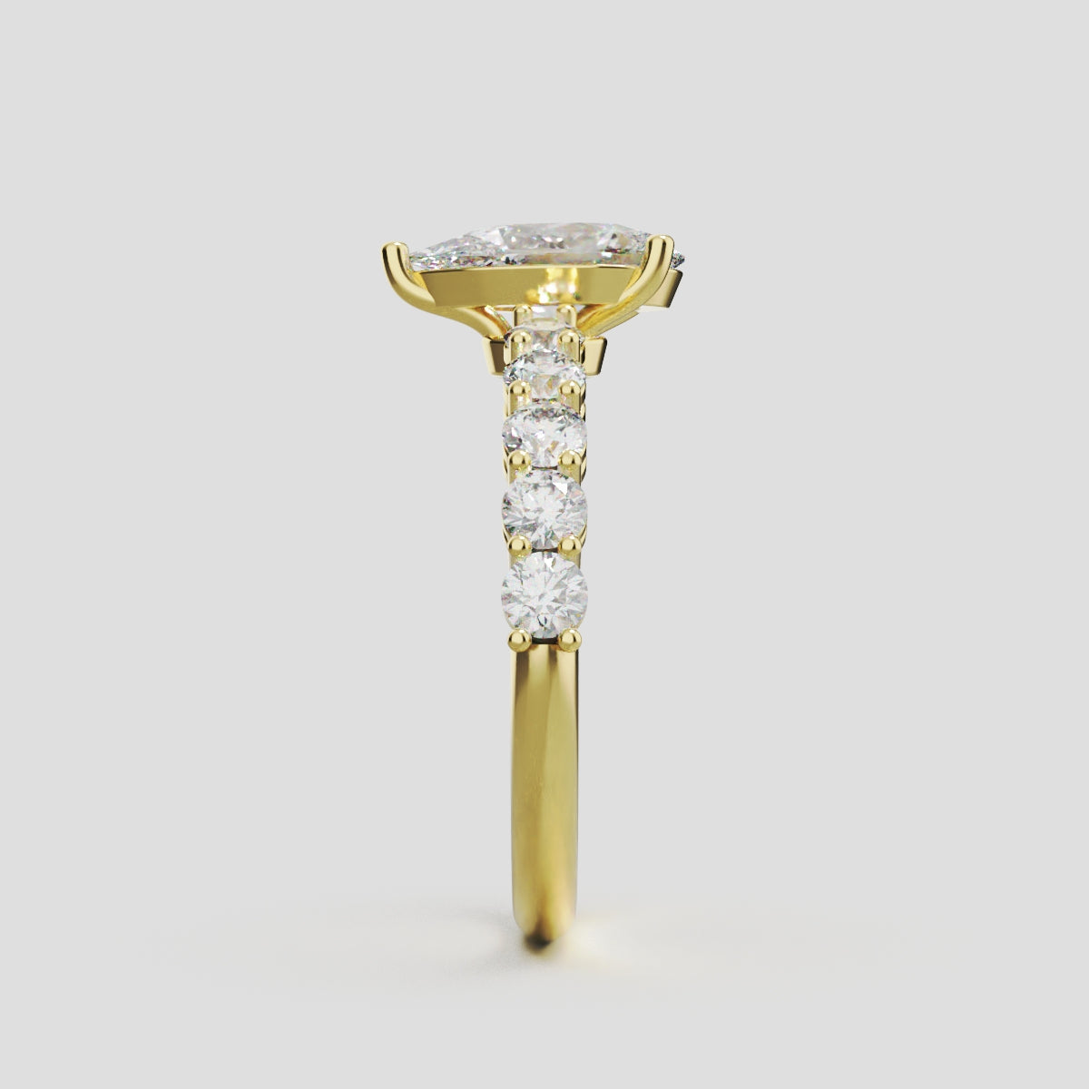 Stilla, 1ct pear lab grown diamond engagement ring, 2.5mm Side Stones, 18K yellow gold - side view