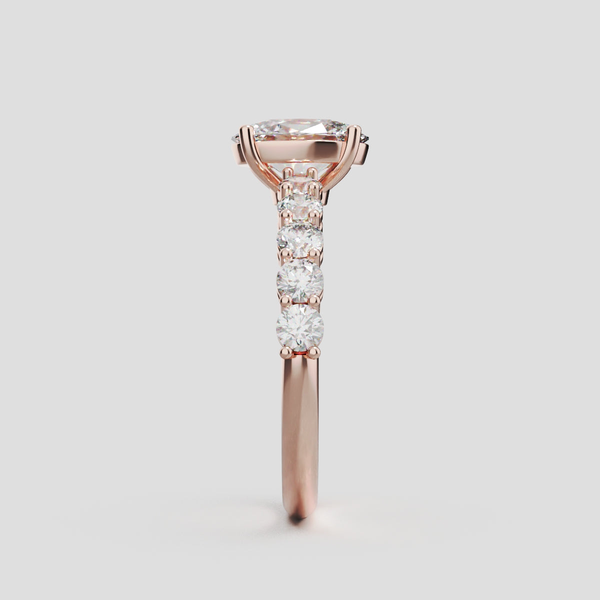 Rivo, 1ct oval lab grown diamond engagement ring, 2.5mm Side Stones, 18K rose gold - side view