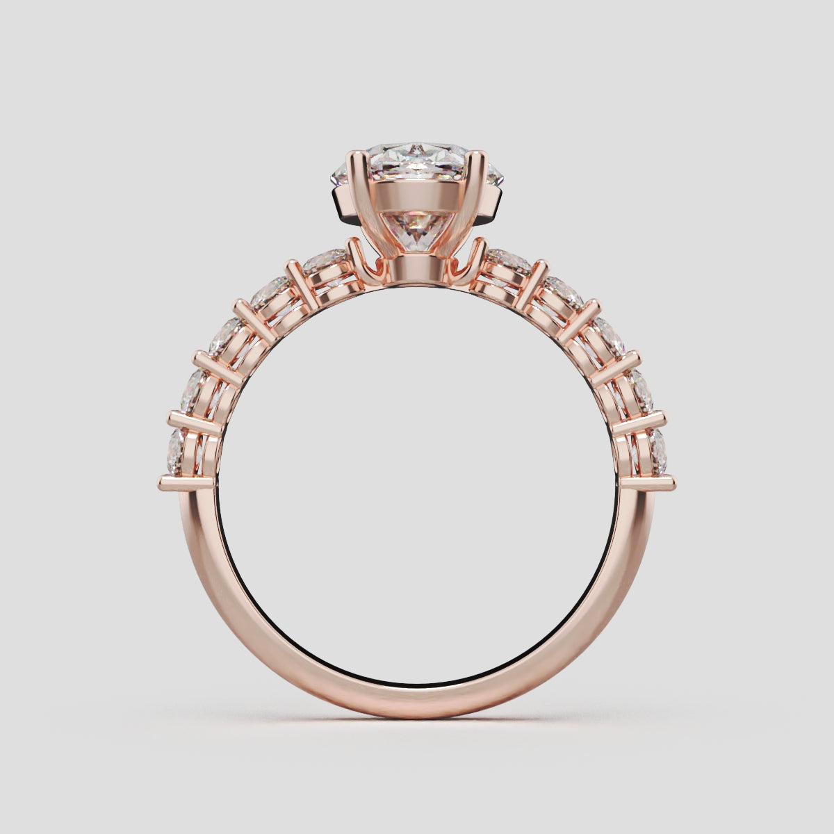 Rivo, 2ct oval lab grown diamond engagement ring, 2.5mm Side Stones, 18K rose gold - through finger