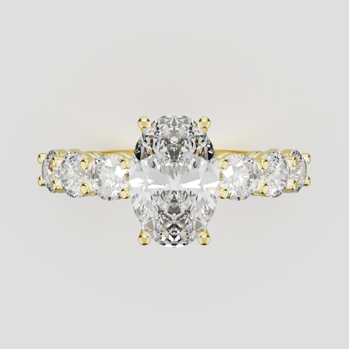Delta, 1.5ct oval lab grown diamond engagement ring, 3.5mm Side Stones, 18K yellow gold - front view