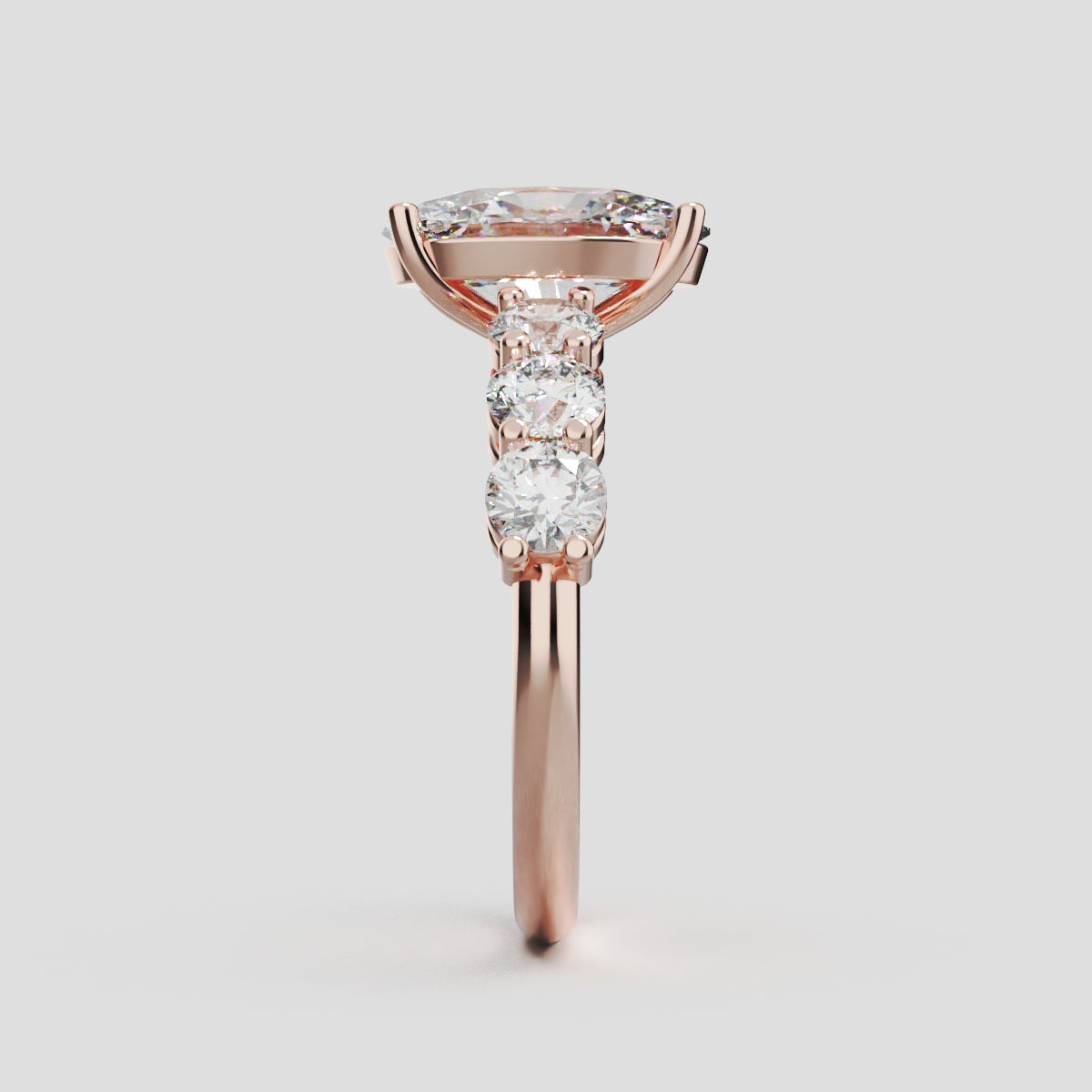Delta, 2ct oval lab grown diamond engagement ring, 3.5mm Side Stones, 18K rose gold - side view