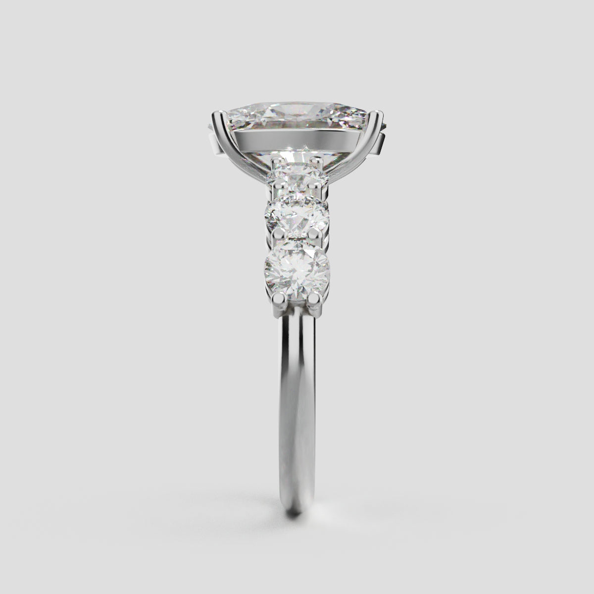 Delta, 2ct oval lab grown diamond engagement ring, 3.5mm Side Stones, 18K white gold - side view