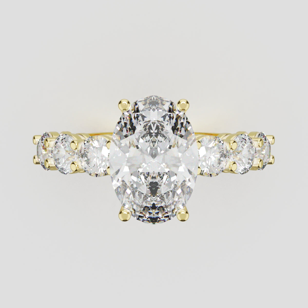 Delta, 2ct oval lab grown diamond engagement ring, 3.5mm Side Stones, 18K yellow gold - front view