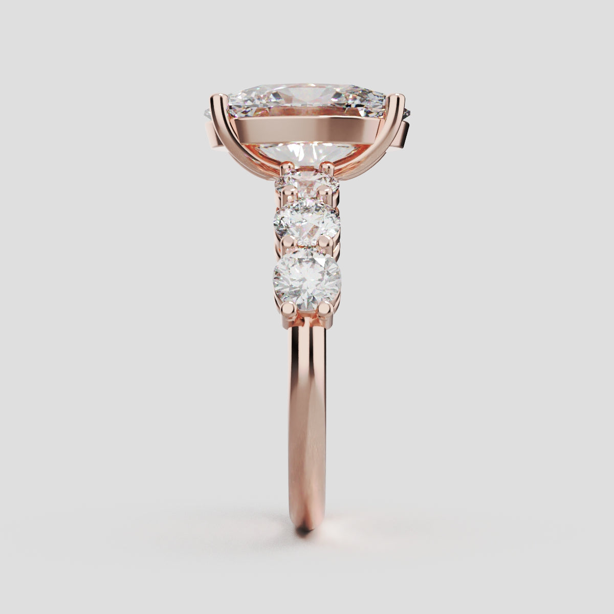 Delta, 3ct oval lab grown diamond engagement ring, 3.5mm Side Stones, 18K rose gold - side view
