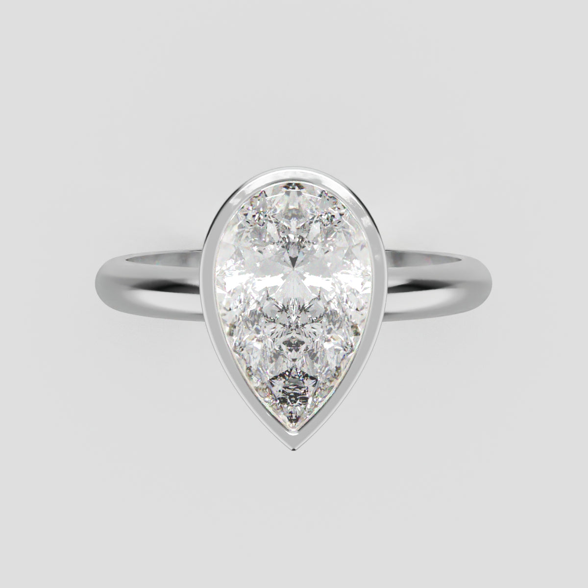 Scudo, 1.5ct pear lab grown diamond engagement ring, Bezel, 18K white gold - front view