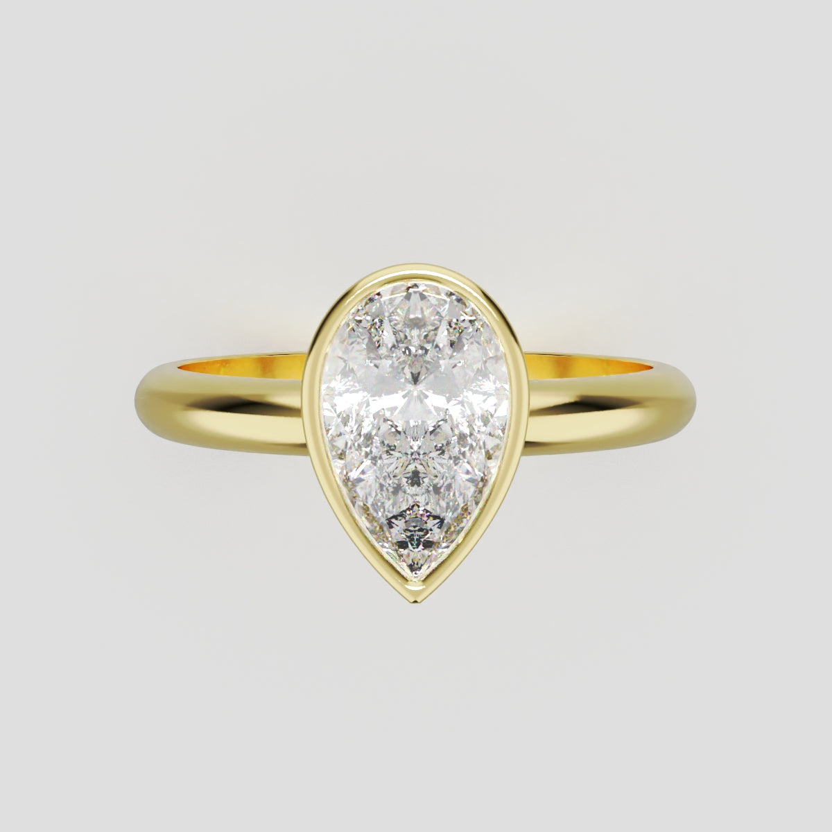 Scudo, 1ct pear lab grown diamond engagement ring, Bezel, 18K yellow gold - front view