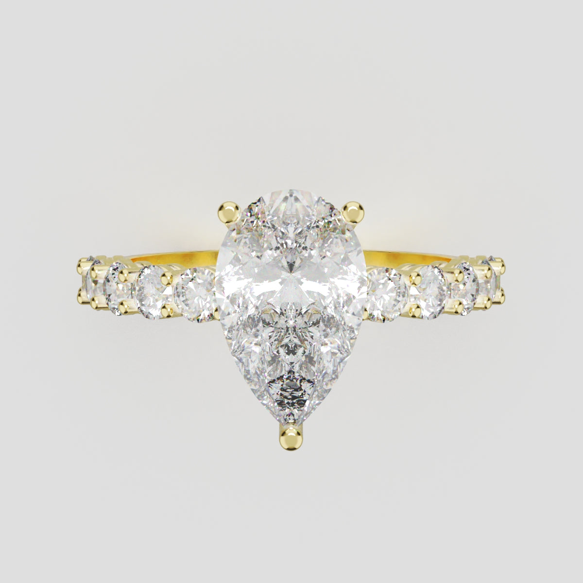 Stilla, 1.5ct pear lab grown diamond engagement ring, 2.5mm Side Stones, 18K yellow gold - front view