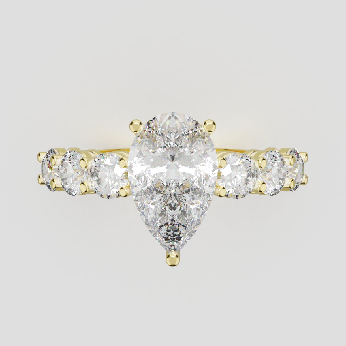 Cascata, 1.5ct pear lab grown diamond engagement ring, 3.5mm Side Stones, 18K yellow gold - front view
