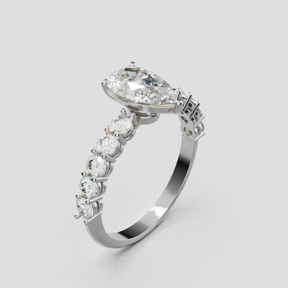Stilla, 1ct pear lab grown diamond engagement ring, 2.5mm Side Stones, 18K white gold - turning
